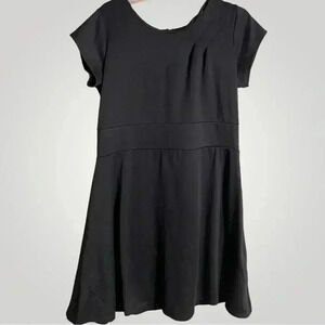 My Collection size large black flared dress with back zipper.